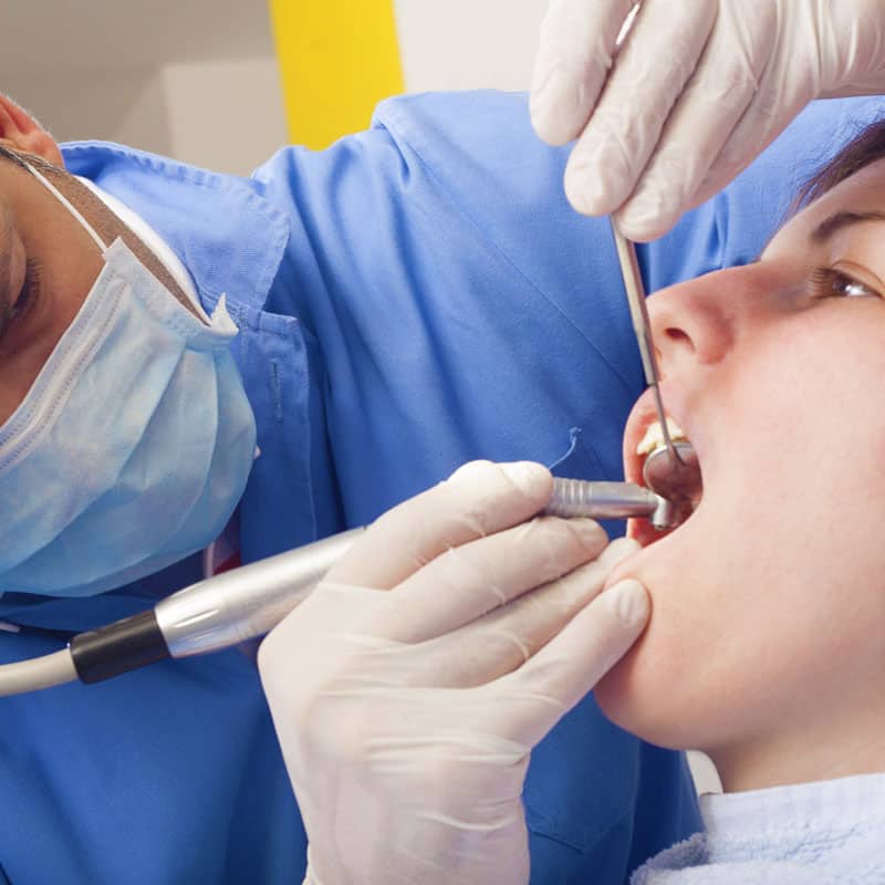Patient being treated with root canal therapy